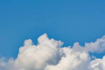 Blue sky background with white clouds