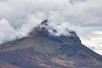 cloud shrouded mountain