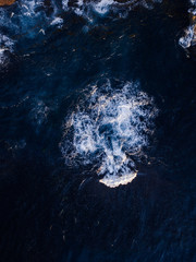 View of small wave coming into the sea shore.