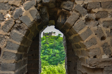 A close-up of the observation window of the beacon fire tower enemy building of the Great Wall in ancient China, Yumuling, Qianxi County, Hebei Province, China.