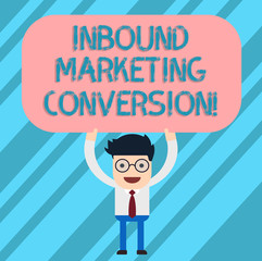Word writing text Inbound Marketing Conversion. Business concept for process of attracting the attention of prospect Man Standing Holding Above his Head Blank Rectangular Colored Board