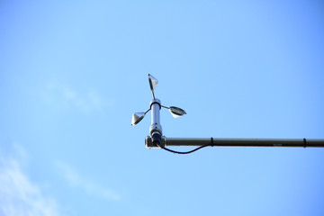 An anemometer is a device used for measuring wind speed, and is also a common weather station...