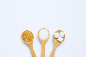 Various types of sugar on white