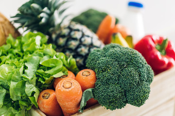 Different fresh fruits and vegetables on the white background.Healthy eating