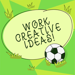 Conceptual hand writing showing Work Creative Ideas. Business photo showcasing has ability to invent and develop original thoughts Soccer Ball on the Grass and Blank Round Color Shape photo