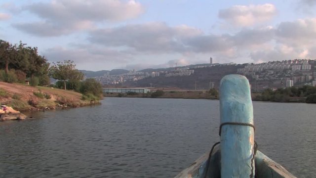 Boat sailing in Kishon River, Haifa Israel