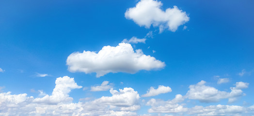 White clouds and blue sky background