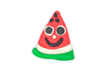 Play dough Watermelon fruit imitation on white background. Handmade clay plasticine