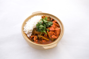Butter chicken curry with Broccoli in Bowl
