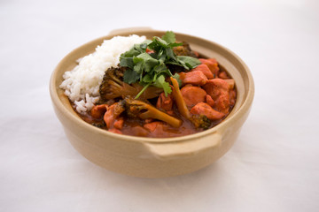 Butter chicken curry with Broccoli in Bowl