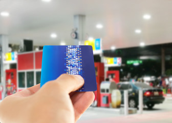 Credit card to make a payment for refueling car on gas station