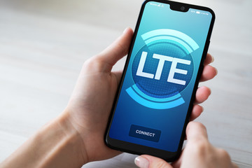 LTE, 5G, Mobile technology and telecommunication concept on smartphone screen.