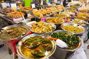 Thai food on a stall at Or Tor Kor market, Chatuchak, Bangkok, Thailand - obrazy, fototapety, plakaty