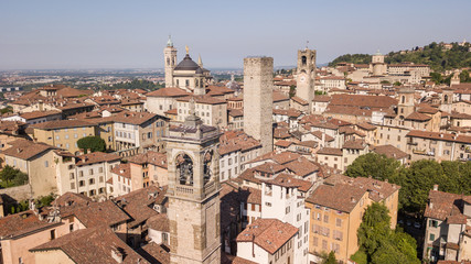 Obraz premium Bergamo, Italy. Amazing drone aerial view of the old town. Landscape at the city center, its historical buildings and the towers