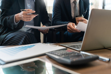 business people and coworker colleagues discussing explanations about week working plan project cooperating in modern coworking office.