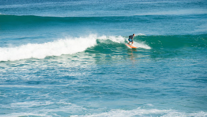 Bali ocean waves on surf spot Dreamland. Indonesia blue ocean resort