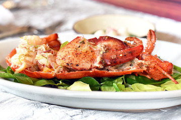 Lobster grilled with spicy thai style dressing sauce, Seafood asian fusion food.