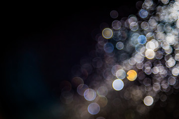 Colorful blur bokeh defocused on black