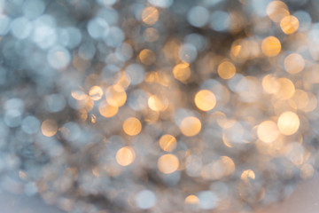 Abstract gold and white bokeh