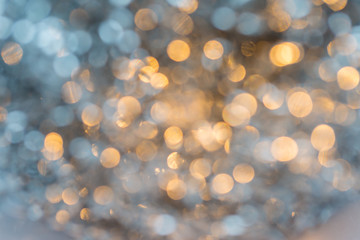Abstract gold and white bokeh