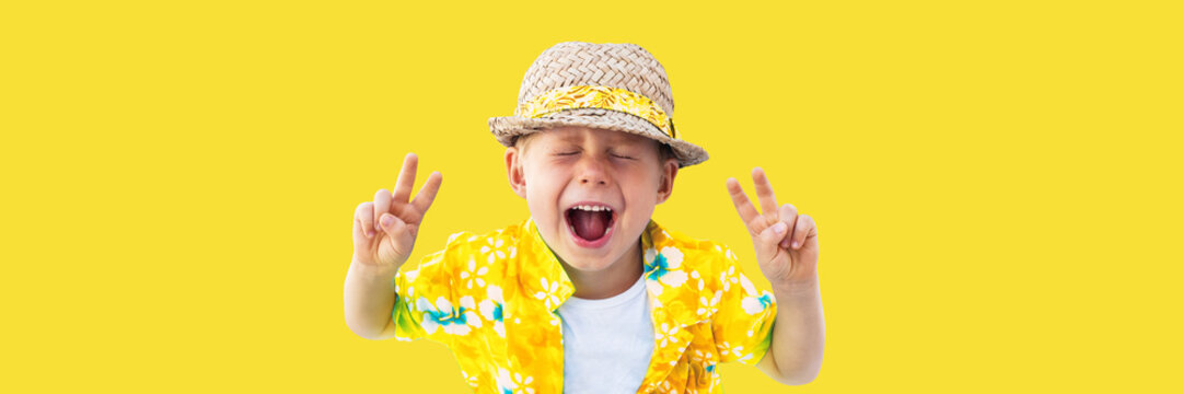 Child in yellow hawaiian shirt and straw hat shouts