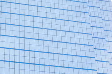 Blue glass windows of office building