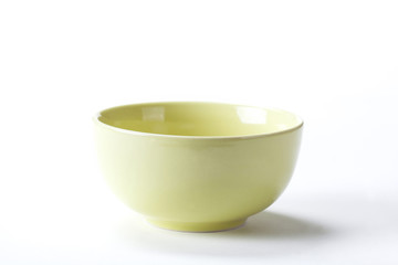 Close up Ceramic green bowl isolated on white background shoot in the studio with space for copy.