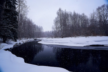 river in winter landscape / snowy view river in icy landscape, winter mist in panoramic landscape
