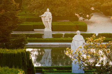 Statues of Campo del Moro garden at sunset Madrid, Spain