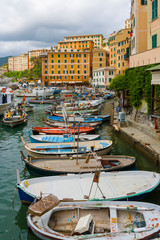 Fototapeta na wymiar View of the Camogli's city on the Ligurian Riviera in Italy whit its porto.