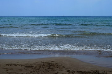 waves on the Mediterranean Sea on the shore of a turtle island in Dalyan, Turkey