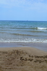 waves on the Mediterranean Sea on the shore of a turtle island in Dalyan, Turkey