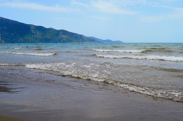 waves on the Mediterranean Sea on the shore of a turtle island in Dalyan, Turkey