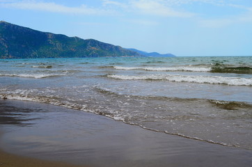 waves on the Mediterranean Sea on the shore of a turtle island in Dalyan, Turkey