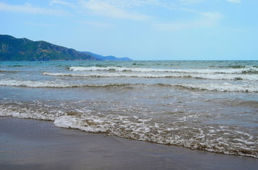 waves on the Mediterranean Sea on the shore of a turtle island in Dalyan, Turkey