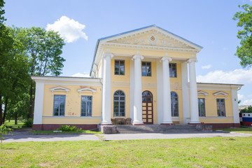 City Jelgava, Latvian Republic. Old yellow manor houses and garden. Jun 9. 2019. Travel photo.