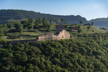 Fototapeta na wymiar View to tower and walls of medieval Trapezitsa fortress,.Veliko Tarnovo in Bulgaria.