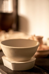 Fototapeta na wymiar White clay bowl