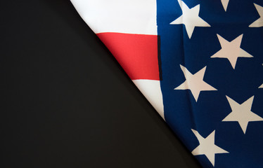 American flag close up in dark background with copy space