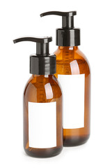 Bottles of shampoo on white background