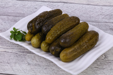 Pickled cucumbers heap in the bowl