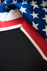American flag close up in dark background with copy space
