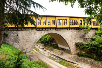 Fototapeta na wymiar Irgandi Bridge is a historical bridge built in the Ottoman period with a bazaar on it.