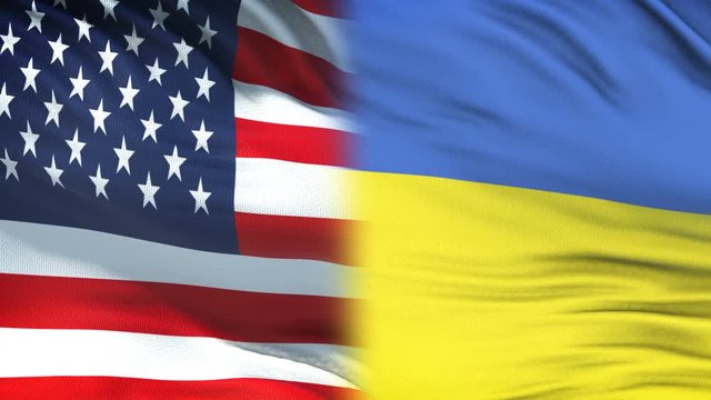 USA and Ukraine officials exchanging confidential envelope, flags background