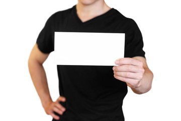 A man holding a white sheet of paper. Holding a booklet. Close up. Isolated on white background