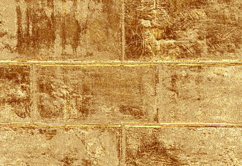 Yellow gold brick wall abstract texture background