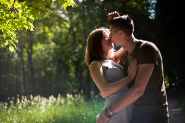 Fototapeta premium Young Couple Walking In The Park