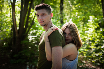 Fototapeta premium Young Couple Walking In The Park