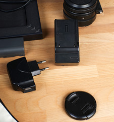 adapter and lens on the table. the photo