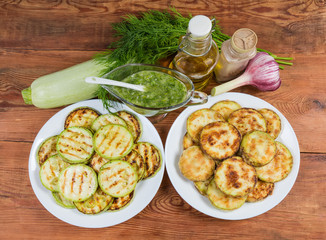 Grilled and fried in batter vegetable marrows, some ingredients, seasonings
